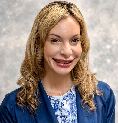 Alexandria Stewart smiling in a professional headshot.