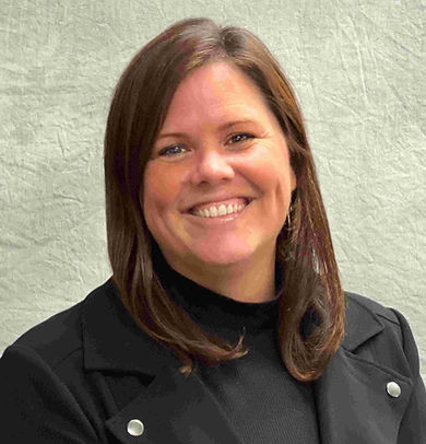 Mary Trujillo smiling in a professional headshot.