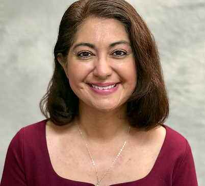 Nancy Manrique Ulloa smiling in a professional headshot.