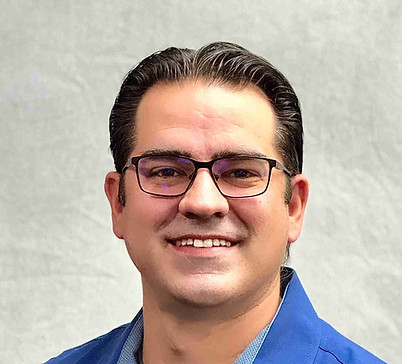 Steven Norton smiling in a professional headshot.